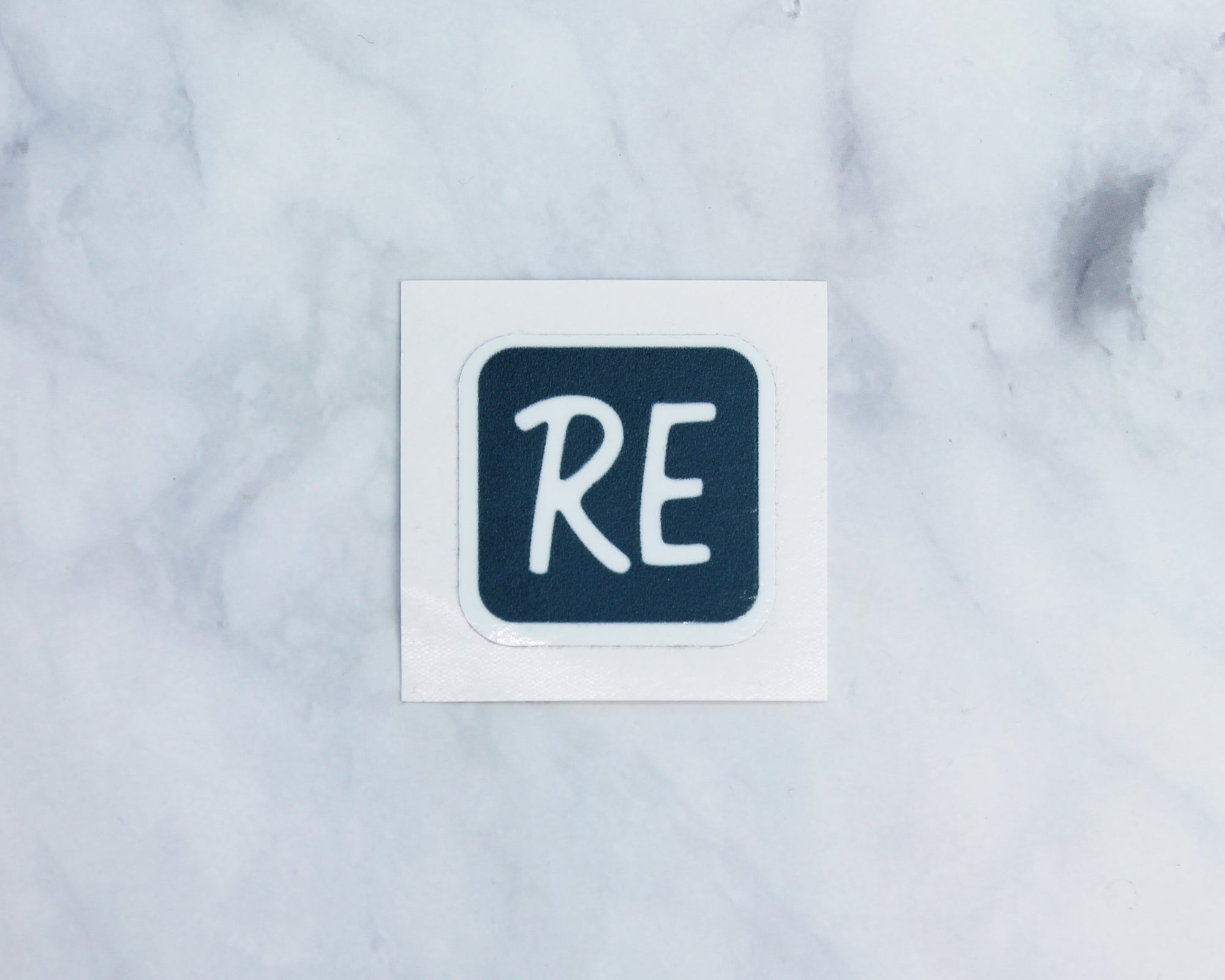 RE logo sticker